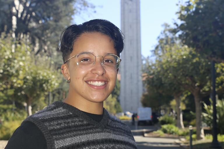 des marie jackson poses in front of the Berkeley Campanile
