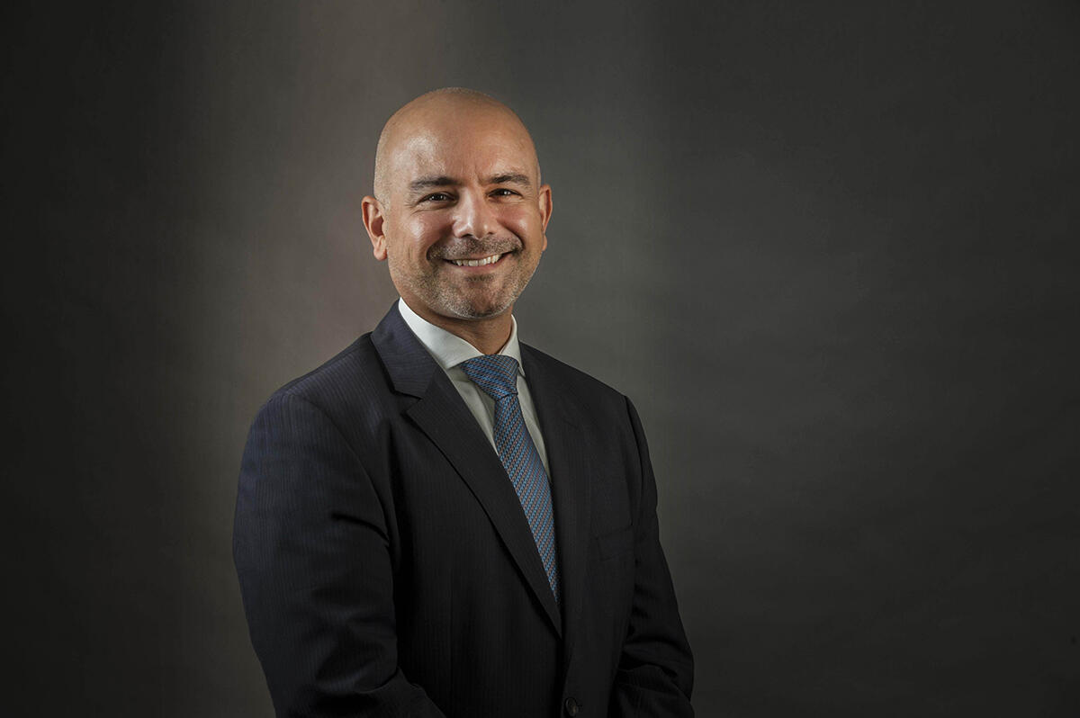 Dr. Eric Esrailian smiles at camera