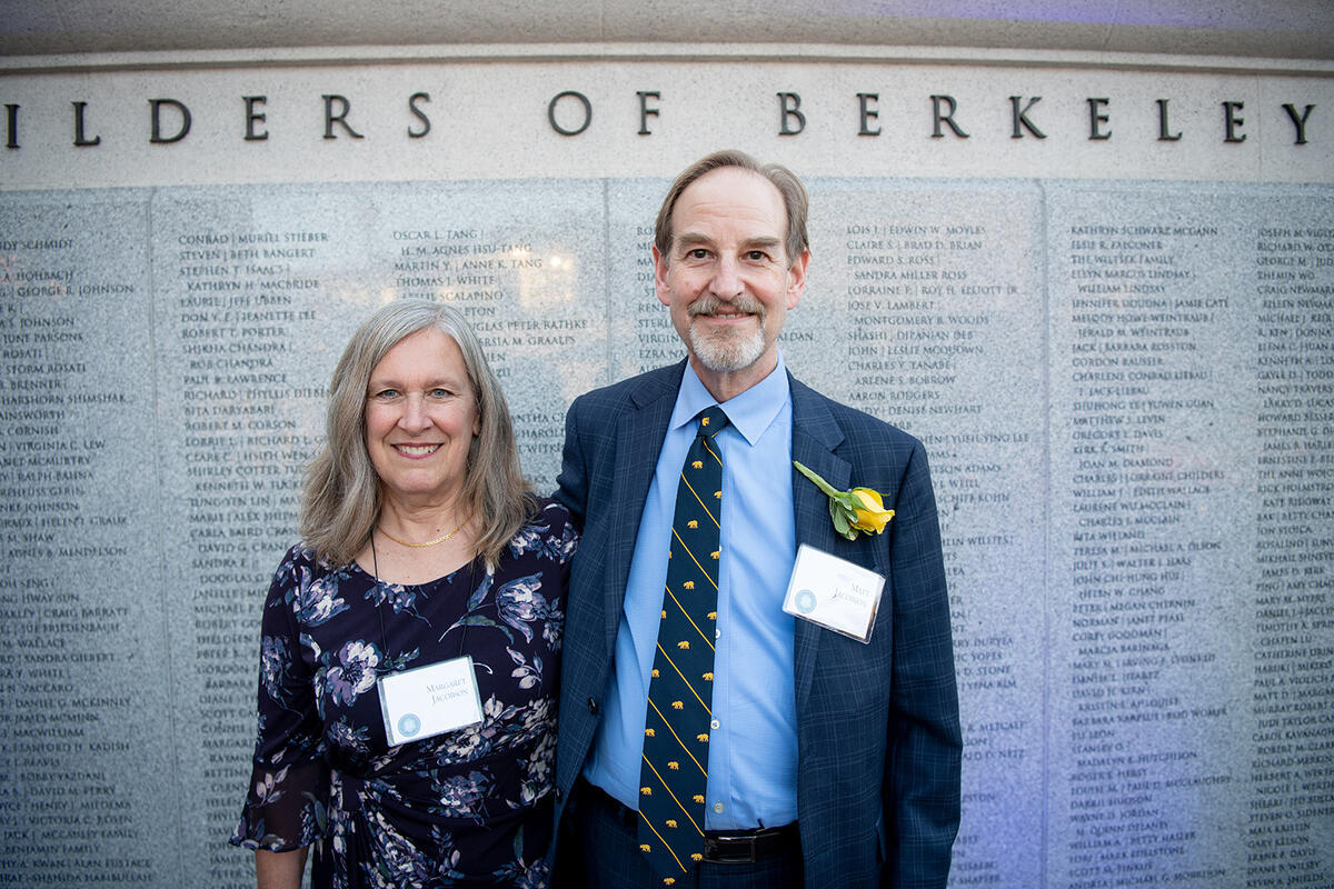 Matt and Margaret Jacobson standing in front of Builders of Berkeley plaque