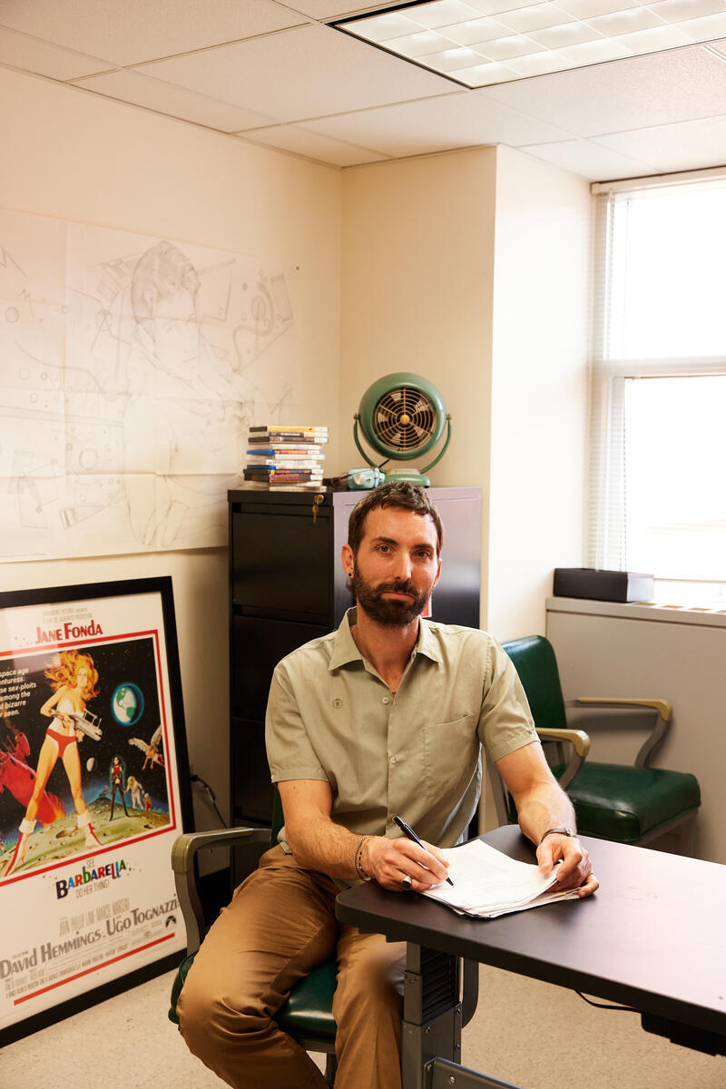 damon young sitting at a desk in his office